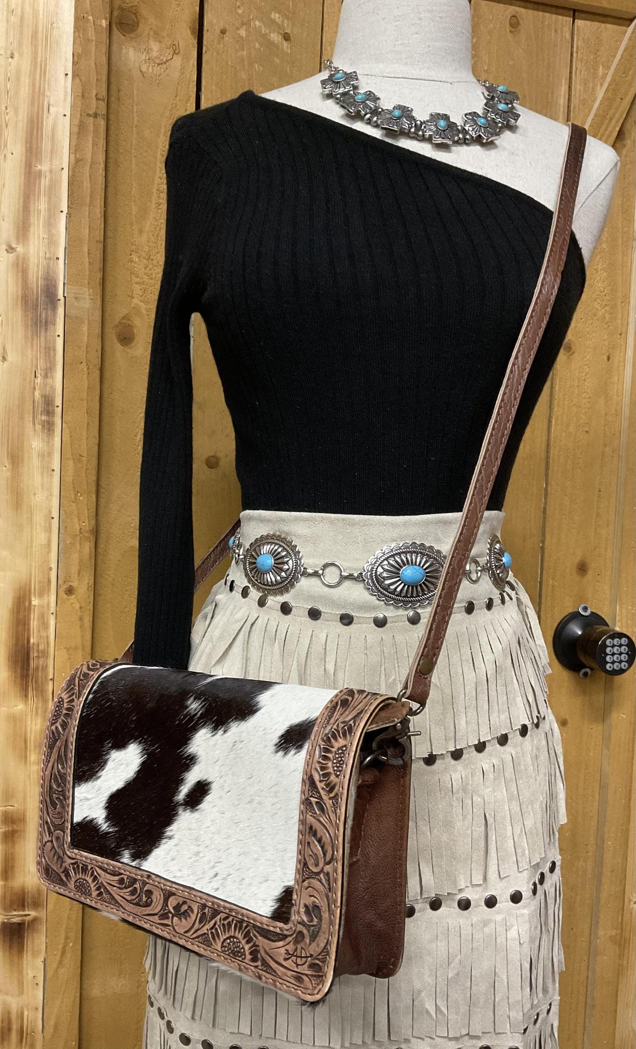 GRACE TOOLED COW PRINT CROSSBODY PURSE