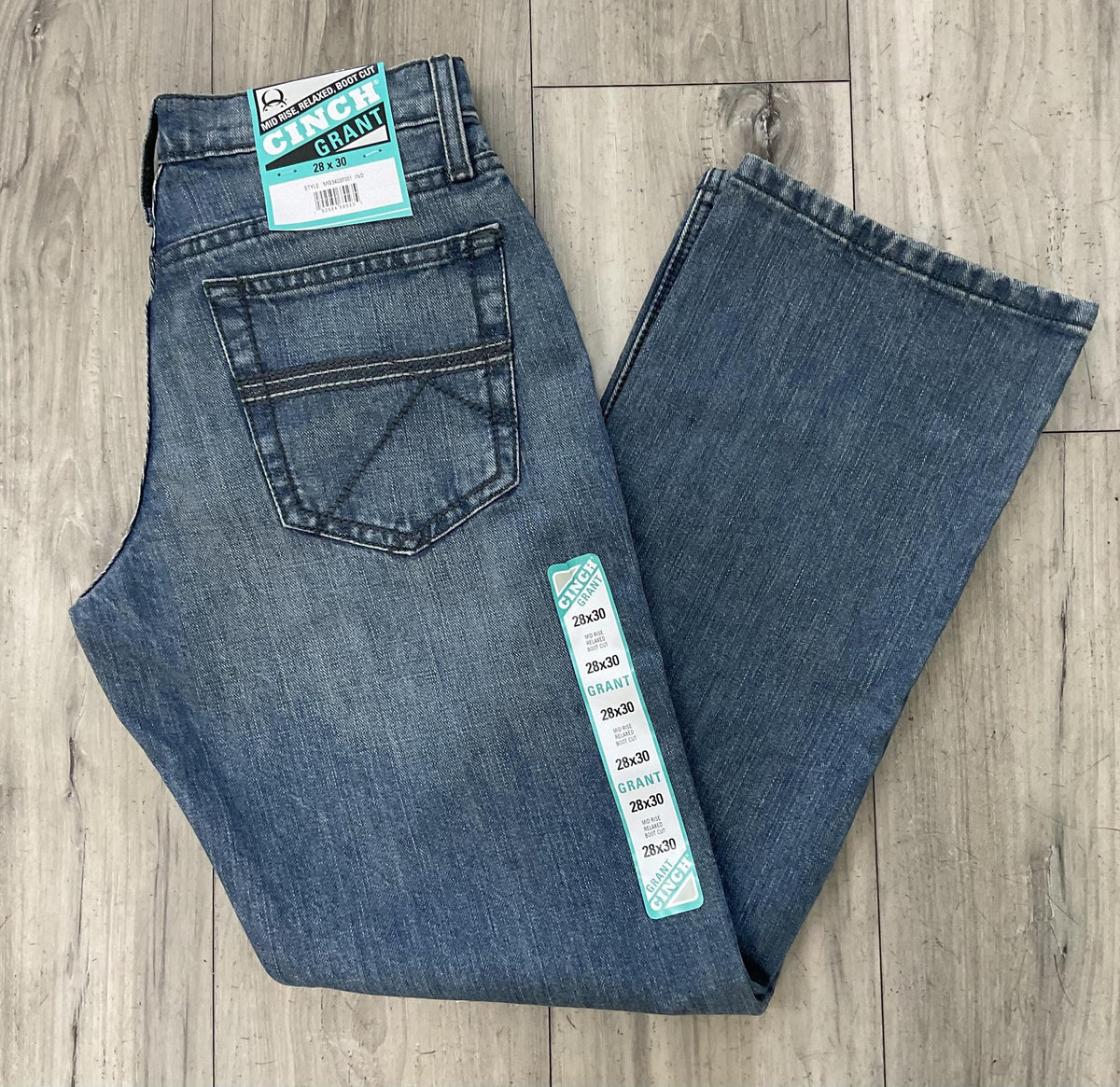 CINCH GRANT MEN’S  MEDIUM STONE INDIGO MID RISE RELAXED BOOT CUT JEANS | MB34037001