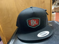 Red dirt shield cap