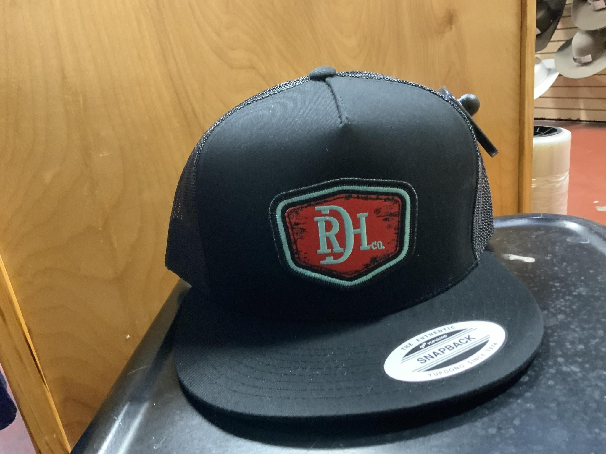 Red dirt shield cap